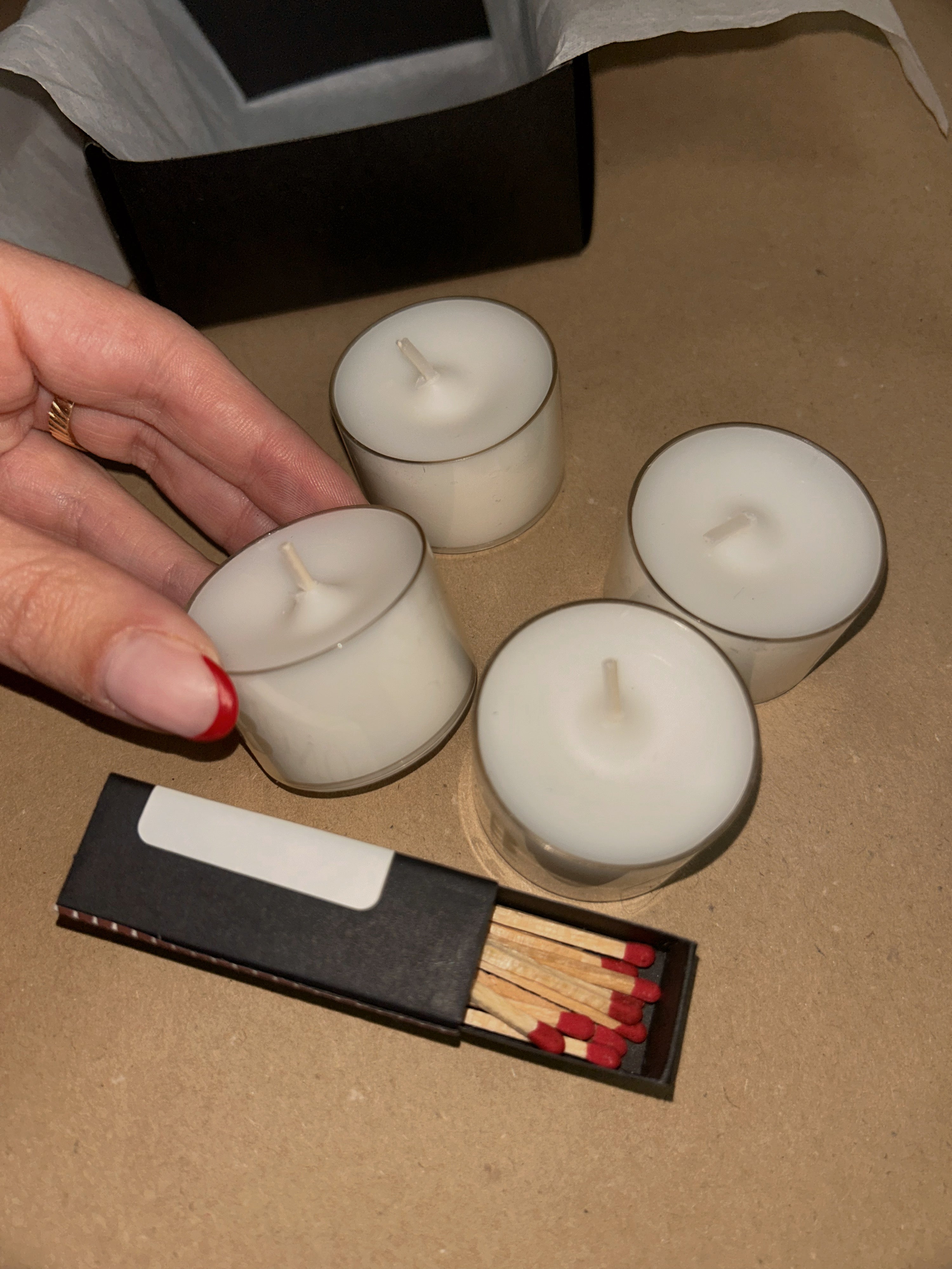 4 velas de té (8h\und) + cerillas